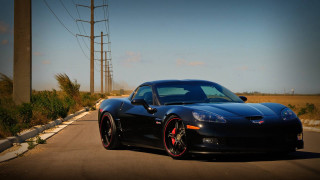Black sports car power pole - a black sports car free wallpaper for desktop