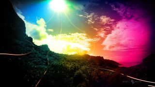 Rainbow colored sky clouds sun - a trail free wallpaper for desktop