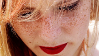 Freckled hair red lipstick smiling - pointillism free wallpaper for desktop