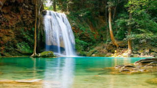 Waterfall forest clear blue river - a waterfall in a forest free wallpaper