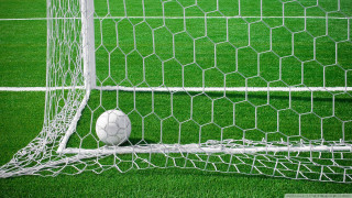 Soccer ball goal net field - a soccer ball free wallpaper