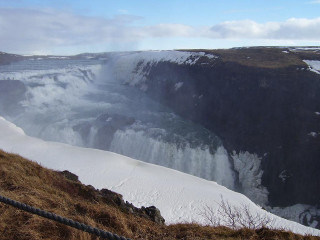Waterfall snow fence person hill - a large waterfall free wallpaper