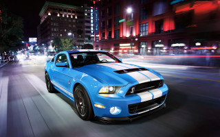Blue mustang driving city night - a blue mustang mustang free wallpaper for desktop