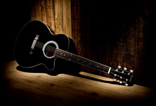 Guitar wooden table dark spotlight - a guitar free wallpaper