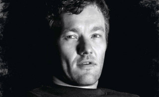 Man black jersey serious look - his face and shoulders free wallpaper for desktop