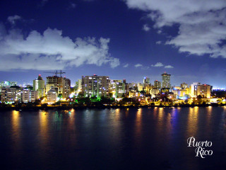 City skyline night water cloudy - a body of water in front free wallpaper for desktop