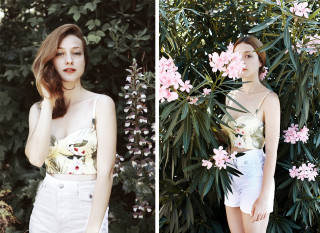 Woman standing bush pink flowers - free vintage wallpaper