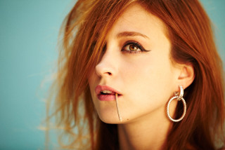 Woman nose piercing serious look - her nose free wallpaper