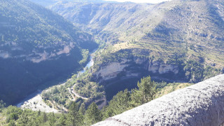 Valley river mountains person ledge - a view of a valley free wallpaper