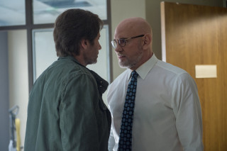 Man tie green shirt talking - a poster free wallpaper