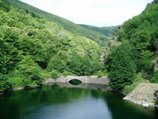 Bridge river trees mountain range - a bridge over the water free wallpaper