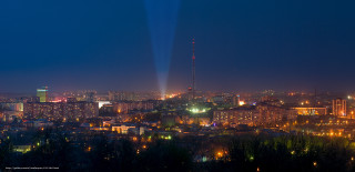 City skyline night light show - a plane free wallpaper for desktop