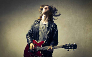 Long haired man playing red - his hair free wallpaper