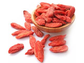 Wooden bowl goji berries white - a white surface free wallpaper