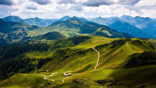 Winding road lush mountain range - winding free wallpaper