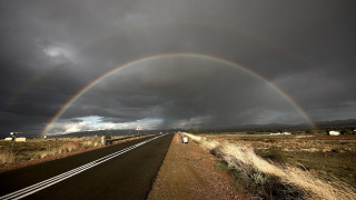 Double rainbow desert road dark 2 - a few cloud above free wallpaper
