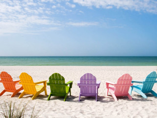 Colorful chairs beach ocean blue - a sandy beach next free wallpaper