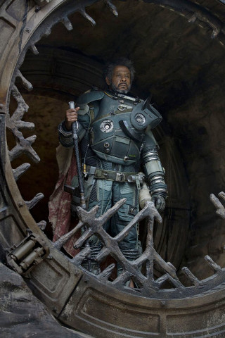 Man space suit gun hole - a man in a space suit holding free wallpaper for mobile