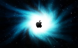 Apple logo blue starburst background - an apple logo free wallpaper