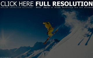 Ski jump sunny air full - the sun shining behind them free wallpaper