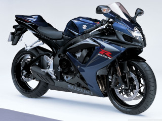 Blue motorcycle white surface black 2 - a blue motorcycle free wallpaper