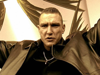 Man leather jacket raising arms - his eye free wallpaper