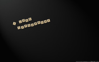 Black background wooden blocks love - a word free wallpaper for desktop