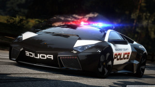 Police car driving forest trees - a police car free wallpaper