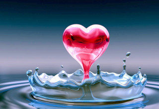 Heart shaped object floating water 3 - a splash of water free wallpaper