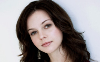 Woman long dark hair necklace 3 - free portrait wallpaper