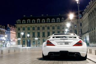 White sports car night building 2 - paris school free wallpaper