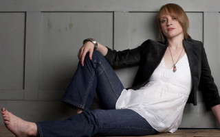 Woman sitting floor legs crossed 8 - arabella rankin free wallpaper