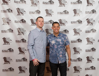 Two men animal rescuers wall - a sign free wallpaper