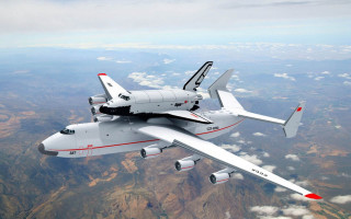 Large white airplane flying sky - epic scale free wallpaper