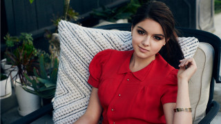 Woman chair pillow plant sitting - a plant behind her free wallpaper