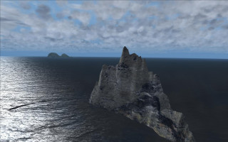 Rock formation ocean cloudy sky - a small island in the middle of the ocean free wallpaper