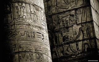 Egyptian columns writing clock wall - the wall behind them free wallpaper