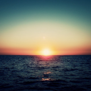 Sunset ocean boat person shore 2 - free sunset wallpaper for tablet