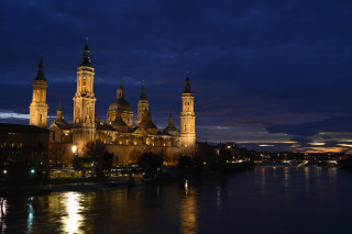Large building towers night river - tower free wallpaper