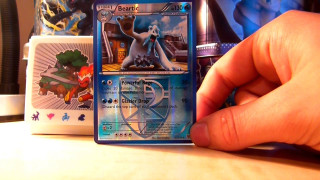 Person holding card table toys - shiny free wallpaper