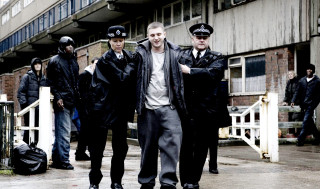 Men walking street building white - a white fence free wallpaper