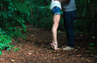 Man woman kissing woods nature - a man and woman free wallpaper