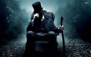 Man top hat coat chair 2 - a man in a top hat free wallpaper