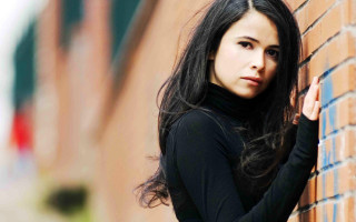 Woman brick wall serious look 2 - cubofuturism free wallpaper