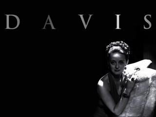 Woman dress holding pillow black - art deco free wallpaper