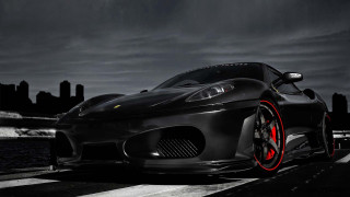Black sports car red rims 2 - a black sports car free wallpaper