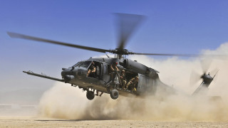 Helicopter flying low desert dust - gear free wallpaper for desktop