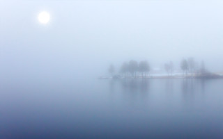 Foggy lake small island trees - volumetric fog free wallpaper