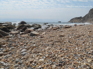 Rocky beach water cliff blue - a rocky beach free wallpaper