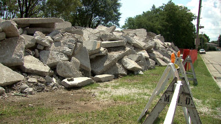 Pile of rocks next to - public works mural free wallpaper